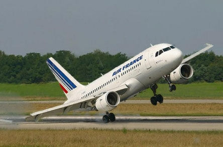 An unbalanced plane takes off.
