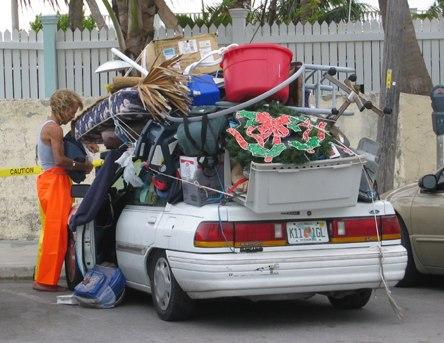 This lady needs to invest in a U-Haul truck.